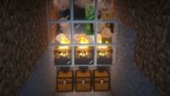 Creepers burning in the farm's collection system (Image via Mojang)